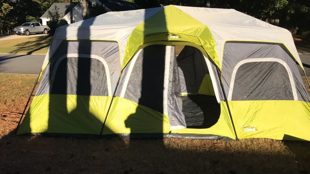 Photo of a tent set up in a backyard as a way to practice for an upcoming family camping trip.